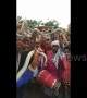 Devotees coil live snakes around the necks during bizarre Hindu festival in Bihar