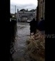 Leyburn residents wade through floodwater after heavy downpours hit North Yorkshire