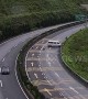 Two people thrown out of minibus after slamming into guardrails on Chinese highway