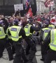 Tommy Robinson supporters clash with police in central London