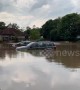Cars float in water at Grangemouth Premier Inn car park in Scotland amid heavy flooding after severe thunderstorm