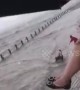Chinese man escapes being swept out to sea after large wave knocks him off his feet