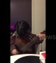 Man-dog shows off his guitar skills