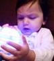 Baby is Amazed About Spinning Light Toy