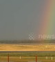 Plane lands at German airport with a stunning rainbow backdrop