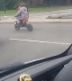 Biker Runs Red Light with Baby Onboard