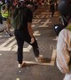 Hong Kong protester uses steel bowl to neutralise tear gas canister
