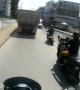 Motorcyclist Narrowly Avoids Oncoming Car