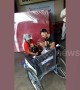 Heartwarming moment tourist gives brand new wheelchair to disabled man begging outside shops