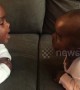 Adorable babies discover they are identical twins