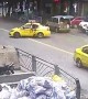 Taxi pulls out onto road in China seeing cyclist fly through its window