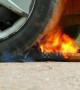 Incredible experiment as car tire takes on burning HOT axe