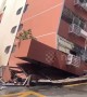 Six-storey residential block topples over onto another building in China's Shenzhen