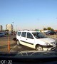Wrong way driver in Romania karmically blows out bumper failing to reverse away