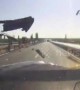Tyre smashes into car on Chinese highway after falling off truck