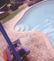 Floridian Falls in Pool with Phone