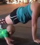 Baby keeps mommy motivated during intense workout
