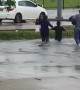 Massive Puddle Surprises Pedestrians