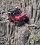 Red Jeep Traverses Across Sketchy Trail