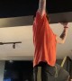 Manager Attempts to Remove Sticky Bra from Ceiling