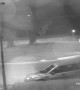 Fleeing Car Flies Over Roundabout