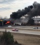 Truck Catches Fire after Colliding with Overpass