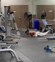 Dude works on his swimming strokes at the gym