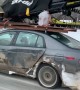 Cheap Car Carries Expensive Snowmobile