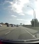 Driver Deftly Dodges Fallen Ladder on Freeway