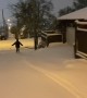 Heavy Snow Turns Streets Into Ski Slopes
