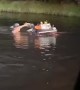 Guy Pushes Four-Wheeler Through the Pond