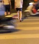 Daring Dudes Make a Harrowing Crossing in Hanoi
