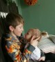 Older Brother Comforting Baby Sister