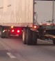 Truck with Broken Trailer Driving on Interstate