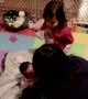 Newborn Has Interesting Response to Sibling's Hug