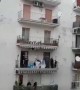 Dance party from the balconies of a neighborhood in Naples