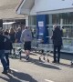 People Line the Block to Enter UK Store