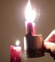 Extinguished Candle Skillfully Reignited in Slow Motion