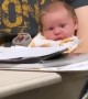 Baby Left Perplexed by Dad's Study Guide