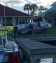 Crash Leaves Boat Beached in Backyard