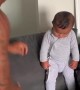Father and Infant Son Perform a Mauri Haka Together