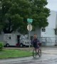 Dog Hitches a Ride on Bicycle Riders Back