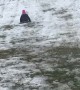 Granddaughter Goes Sledding