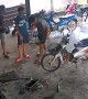 Moped Crashes into Garage
