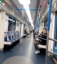 Guy Rides Bicycle in Metro Train
