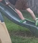 Kid Tries Climbing up Wet Slide