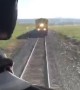 Train Barely Passes Beneath Helicopter