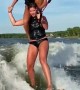 Waterskiing While Perched on Shoulders