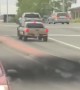 Truck Loses Strapped Bed in Intersection