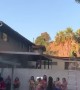 Girl Jumping into Pool From Roof Falls Short